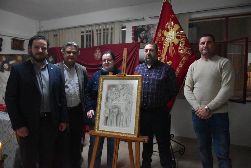 Con el cartel